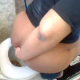 A girl with a plump ass takes a shit while sitting on a toilet. Plopping sounds and grunting are clearly heard. Poop can be seen in the toilet when she wipes. Video is a little sketchy because of a low frame rate in the recording. Over 2.5 minutes.